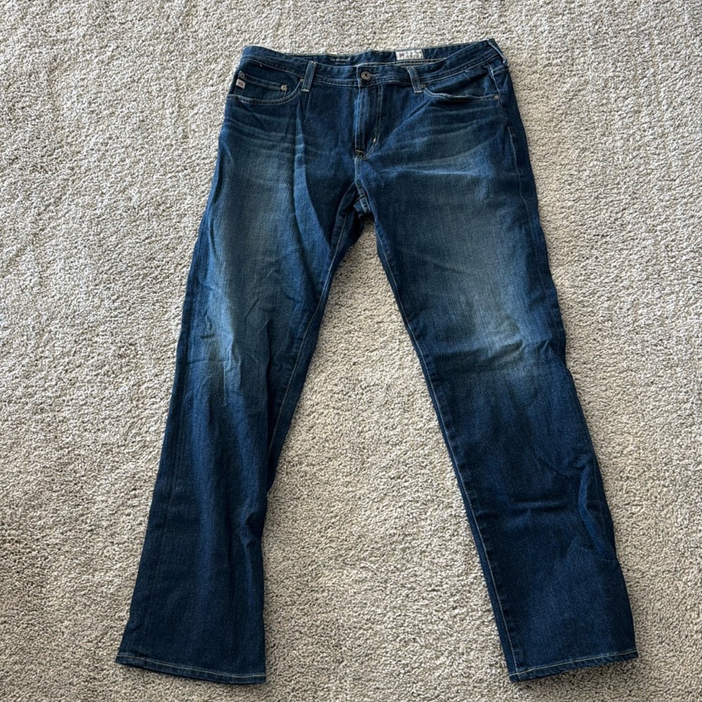 AG Denim 360 Jean. Size 36x32 tailored leg. In dark blue.